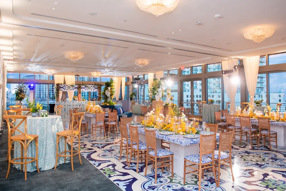 Banquet setup inside the elegant Starlight Ballroom with round tables and chairs. Mr. C Miami – Coconut Grove.