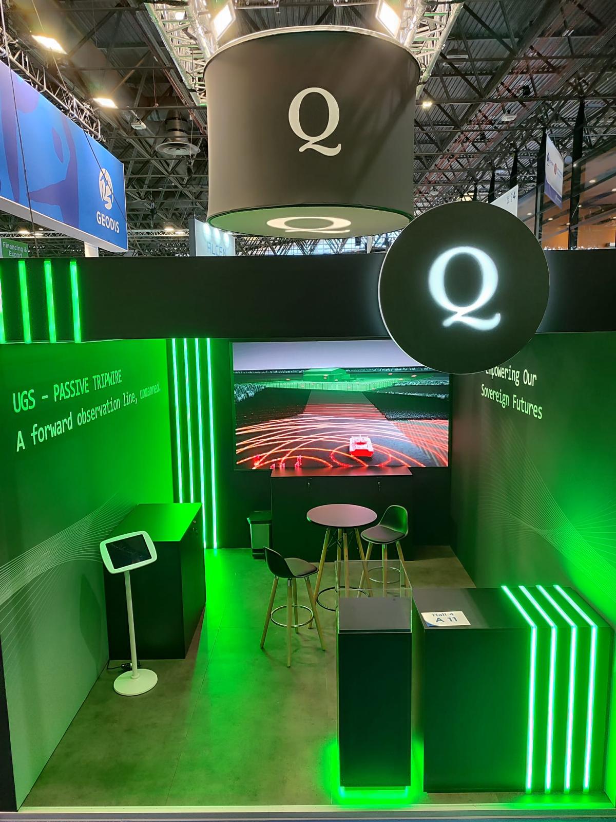 Green technology exhibition stand with illuminated product displays