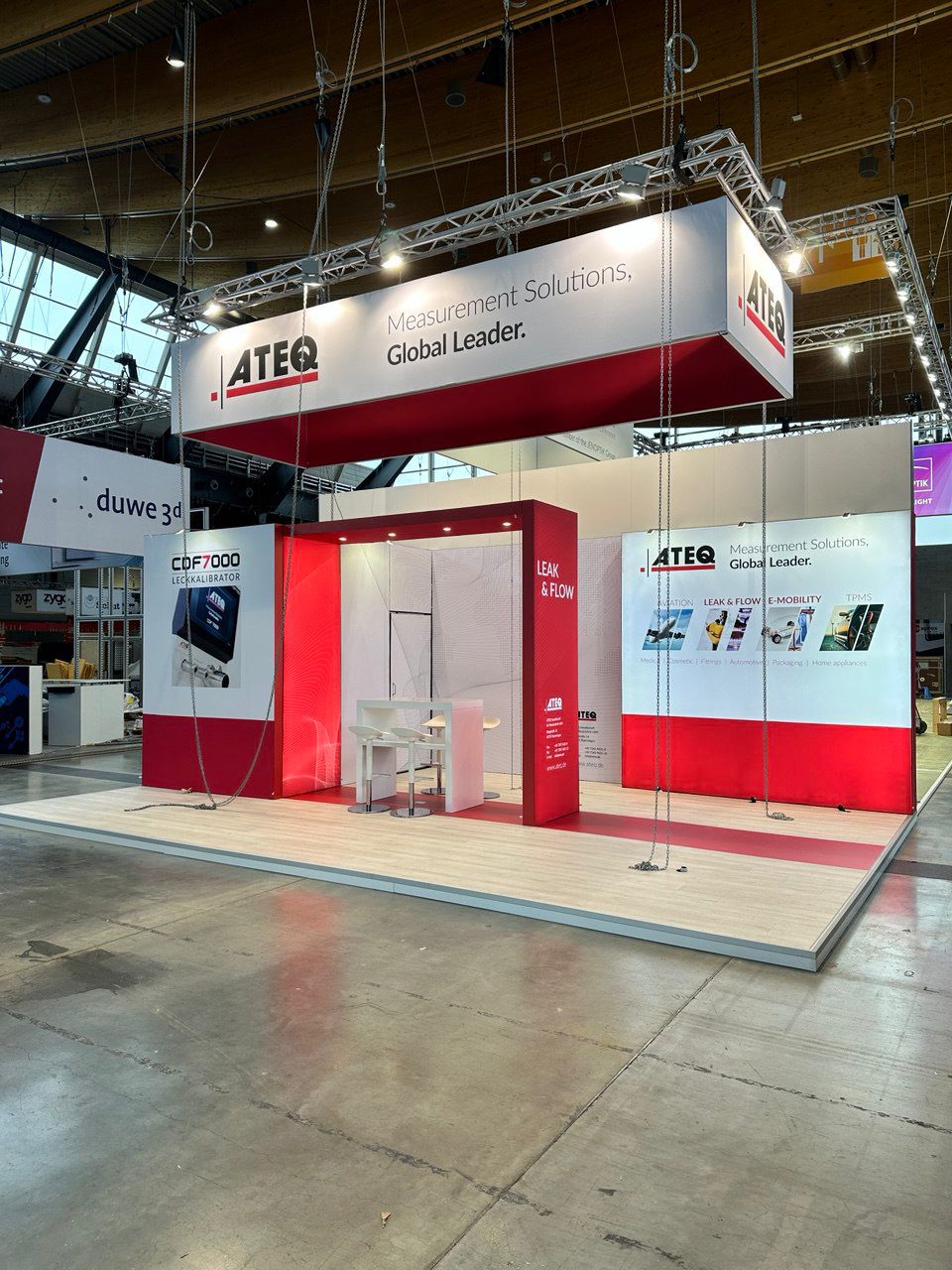 ATEQ measurement technology exhibition stand with product displays