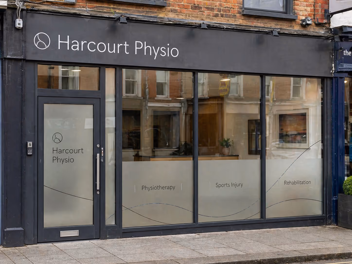 10mm dense white acrylic logo with window frosting at Harcourt Place
