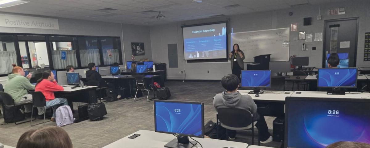 An FNB Bank representative speaking to ATC accounting students about career opportunities during a Power in Partnership classroom visit