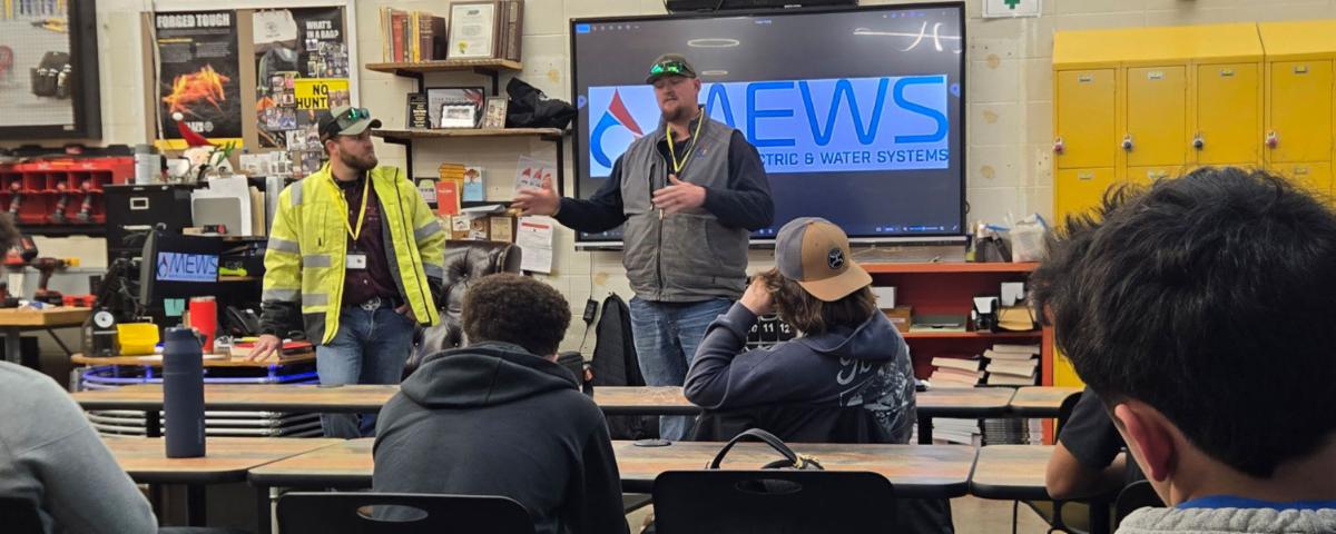 Mayfield Electric & Water Systems linemen presenting to ATC advanced electricity students during a Power in Partnership classroom visit