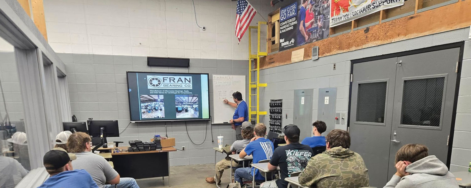 Fran Bearing Co. representative Alex Cunningham presenting to ATC machine tool students during a Power in Partnership classroom visit