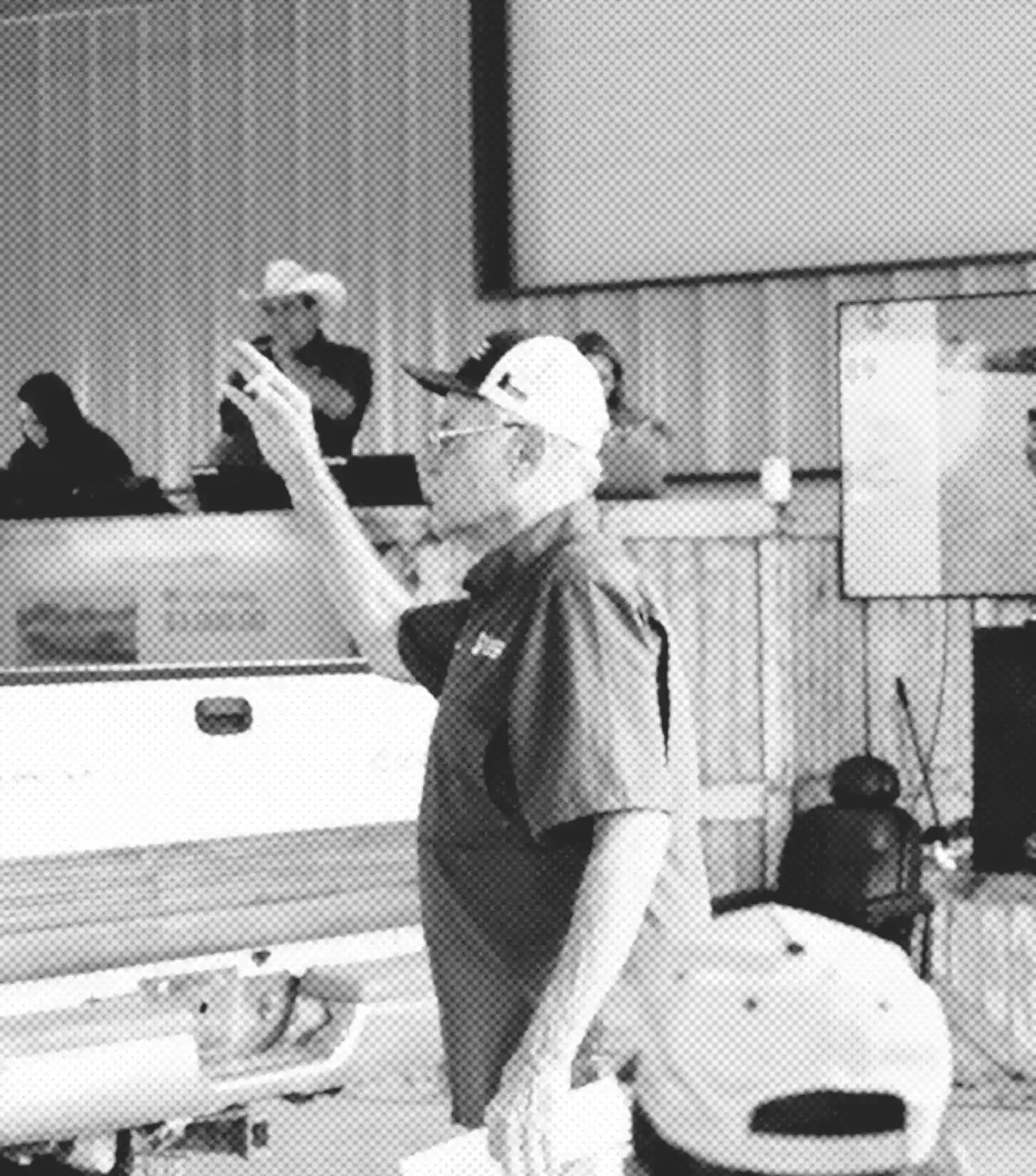 Auctioneer taking bids action shot