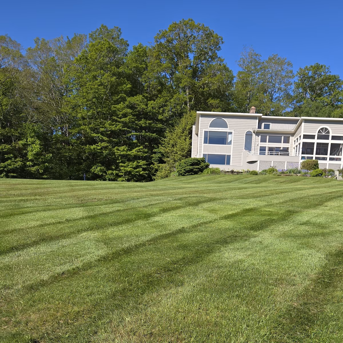 Expert lawn mowing and edging services by Berkshire Land Associates in Southern Berkshire County Massachusetts