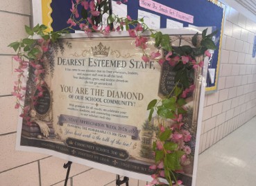 Decorated staff appreciation sign displayed in school hallway