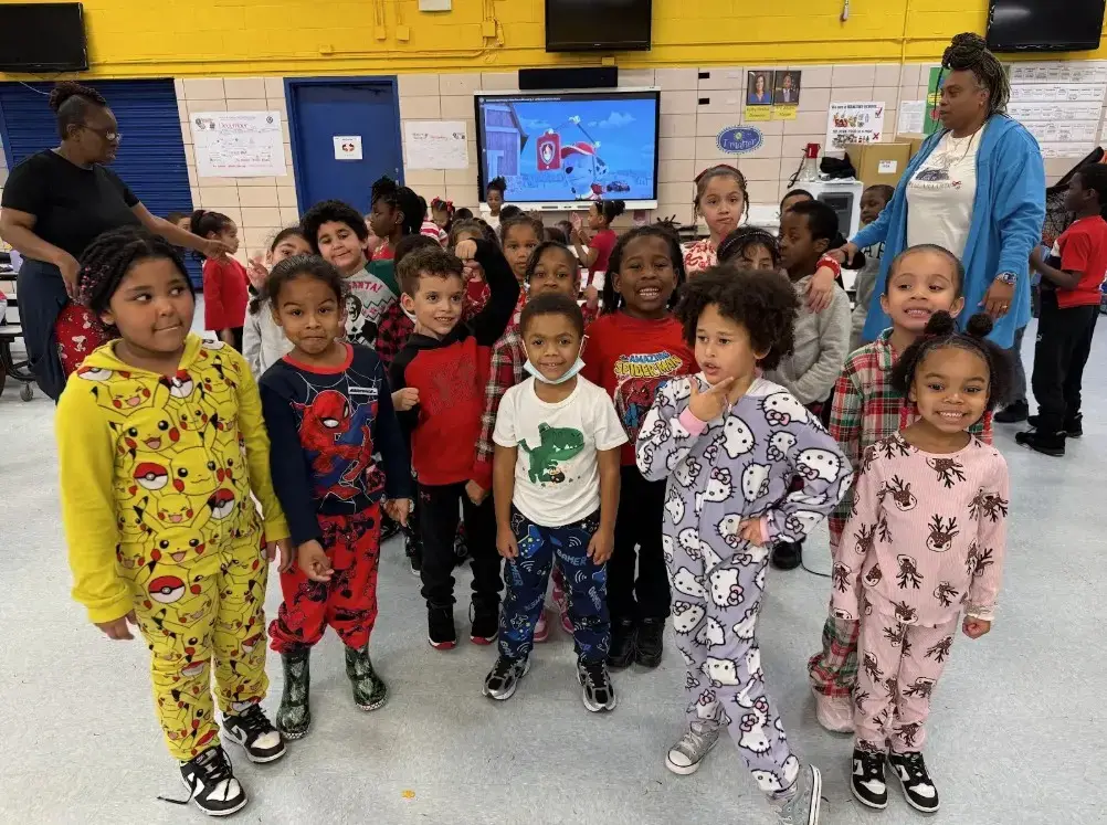 Students wearing pajamas during school pajama day celebration