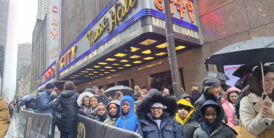 Students lined up outside Radio City Music Hall on field trip