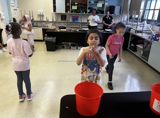 Students participating in a hands-on STEM activity in a classroom