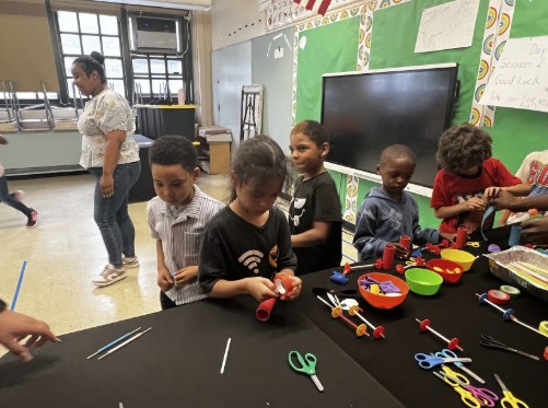 Students working on a hands-on STEM craft activity in class