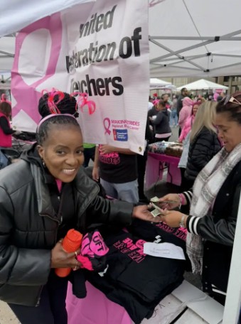 Teachers union members at breast cancer awareness fundraiser event