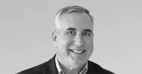 Kelly Stopher, Epilog CFO, smiling in a black-and-white portrait