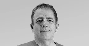 Rony Greenberg, Epilog director, smiling in a black-and-white portrait