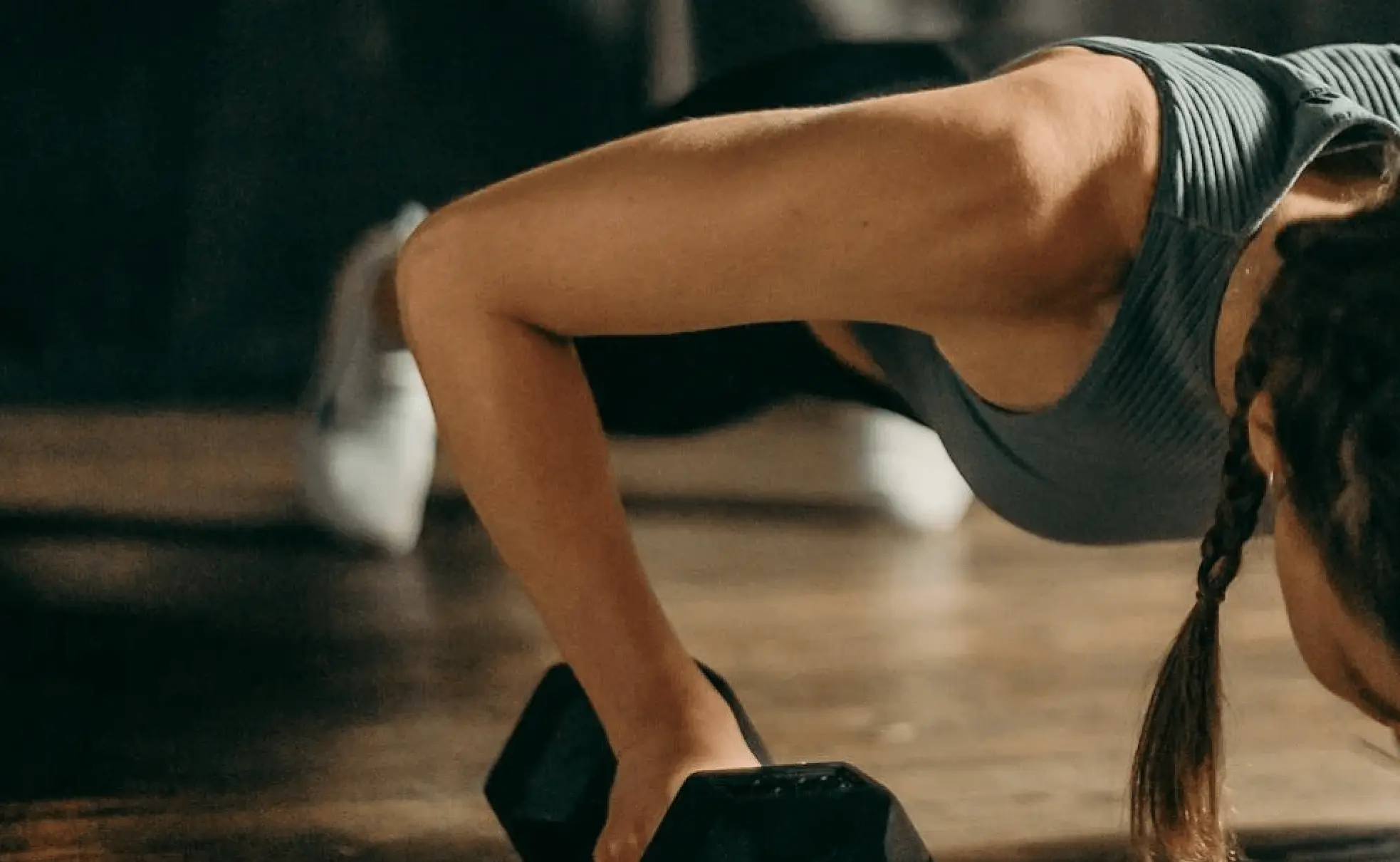 Woman working out with a dumbbell