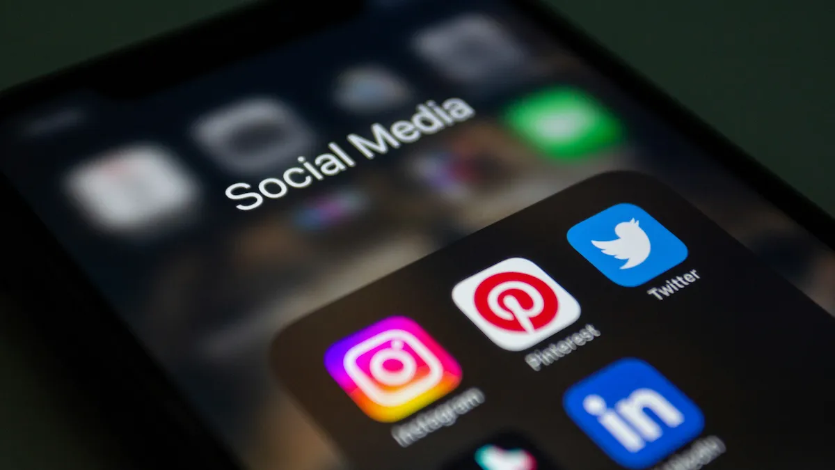 Smartphone screen displaying social media apps including Instagram and Twitter
