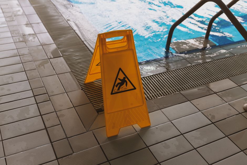 slippery pool deck hazard slippery pool deck hazard