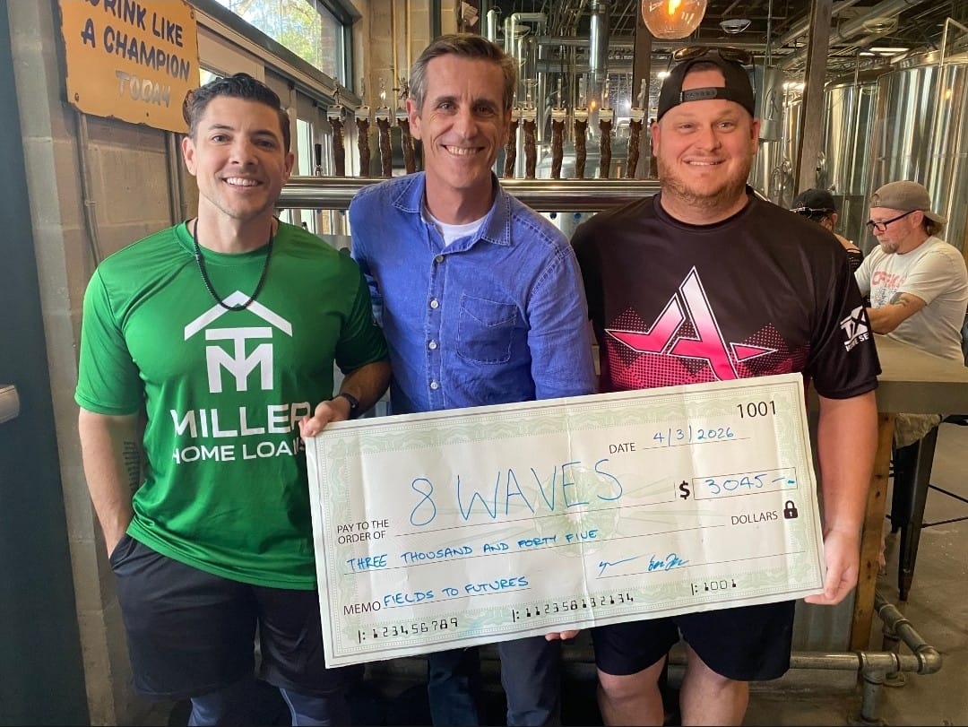 Fields to Future presenting $3,045 raised for 8Waves
