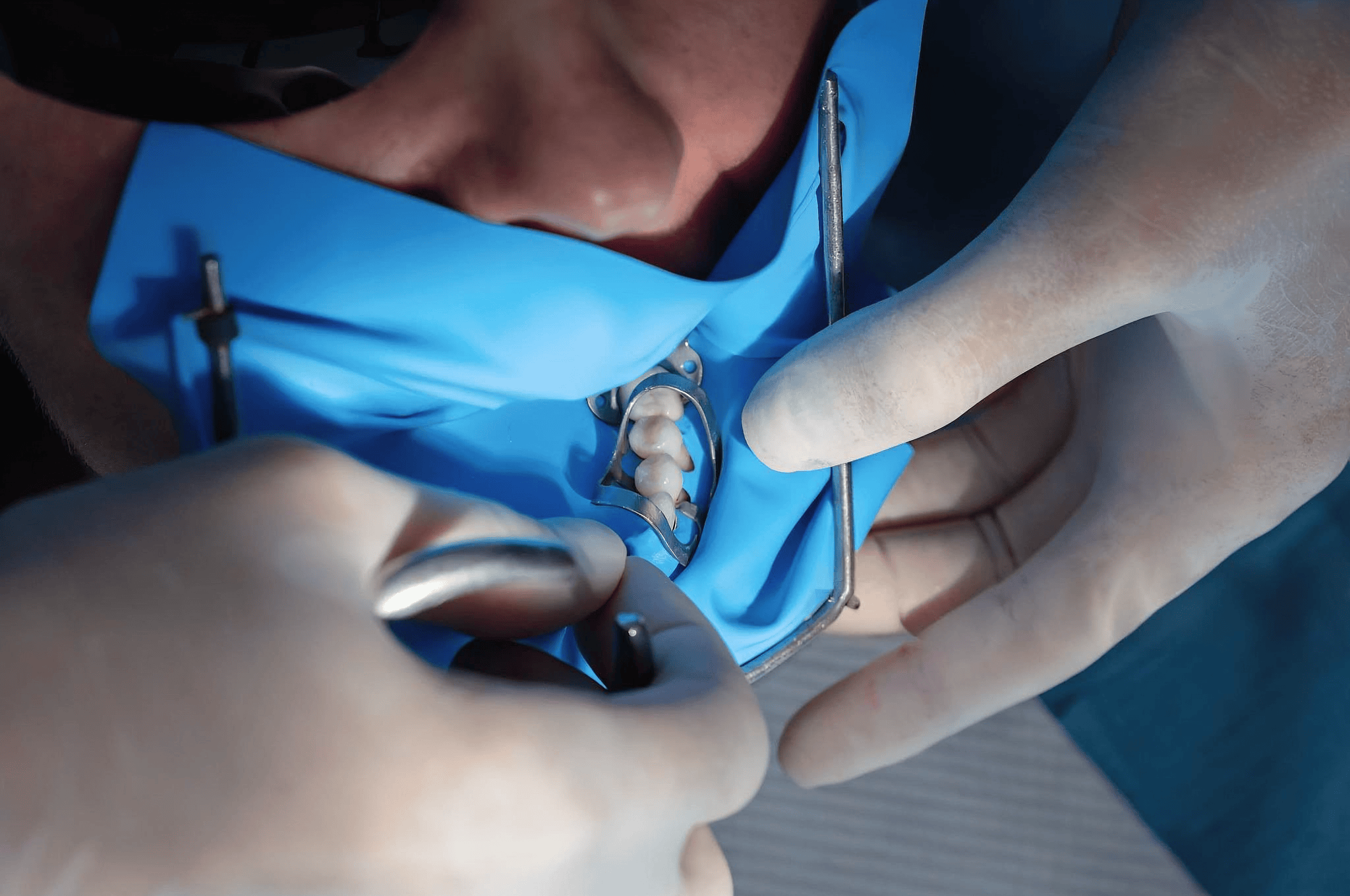 Orthodontist working with dental equipment