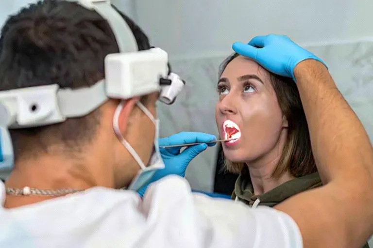 Patient being evaluated with orthodontic imaging technology