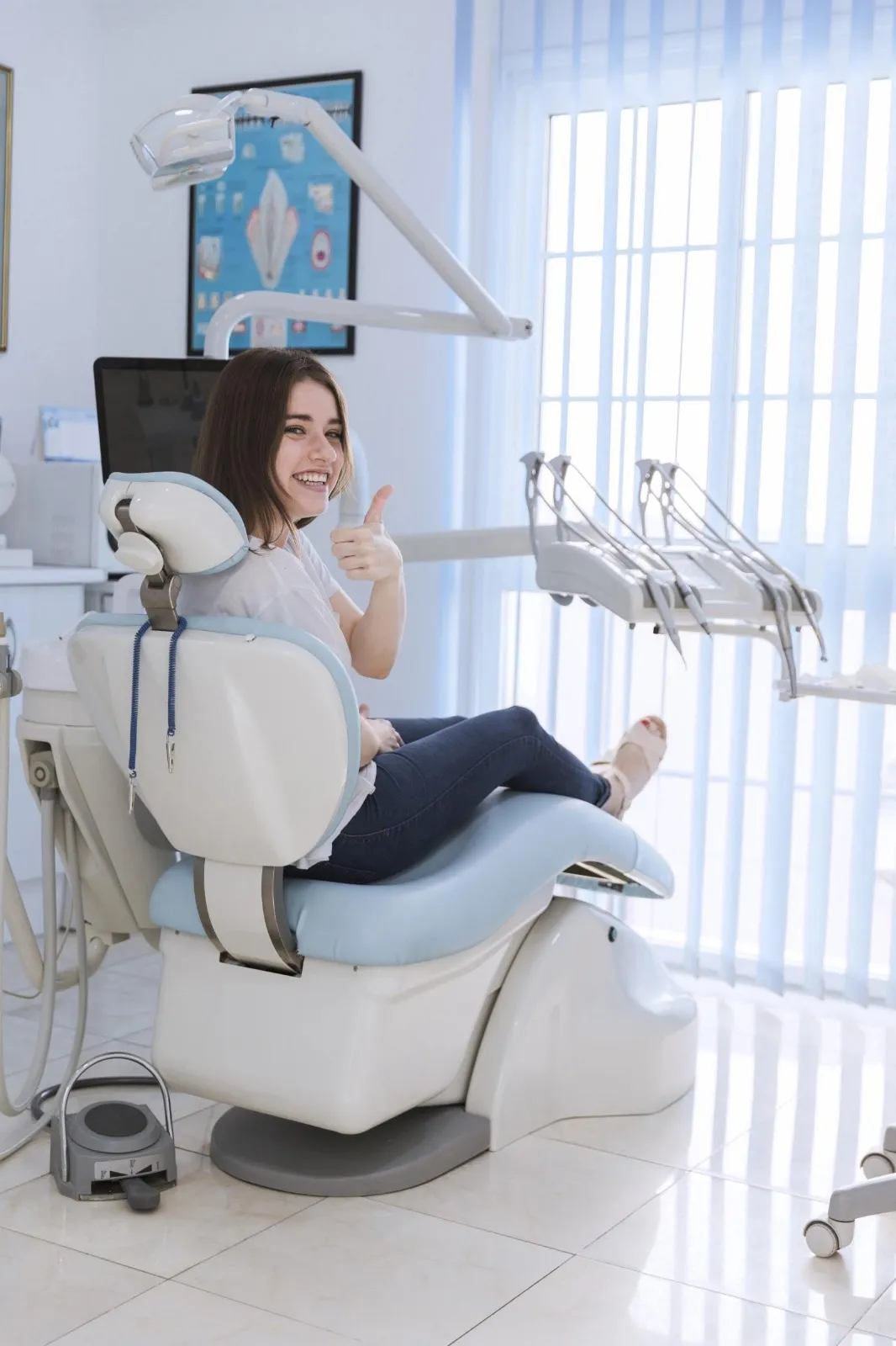 Happy patient reviewing crossbite correction results