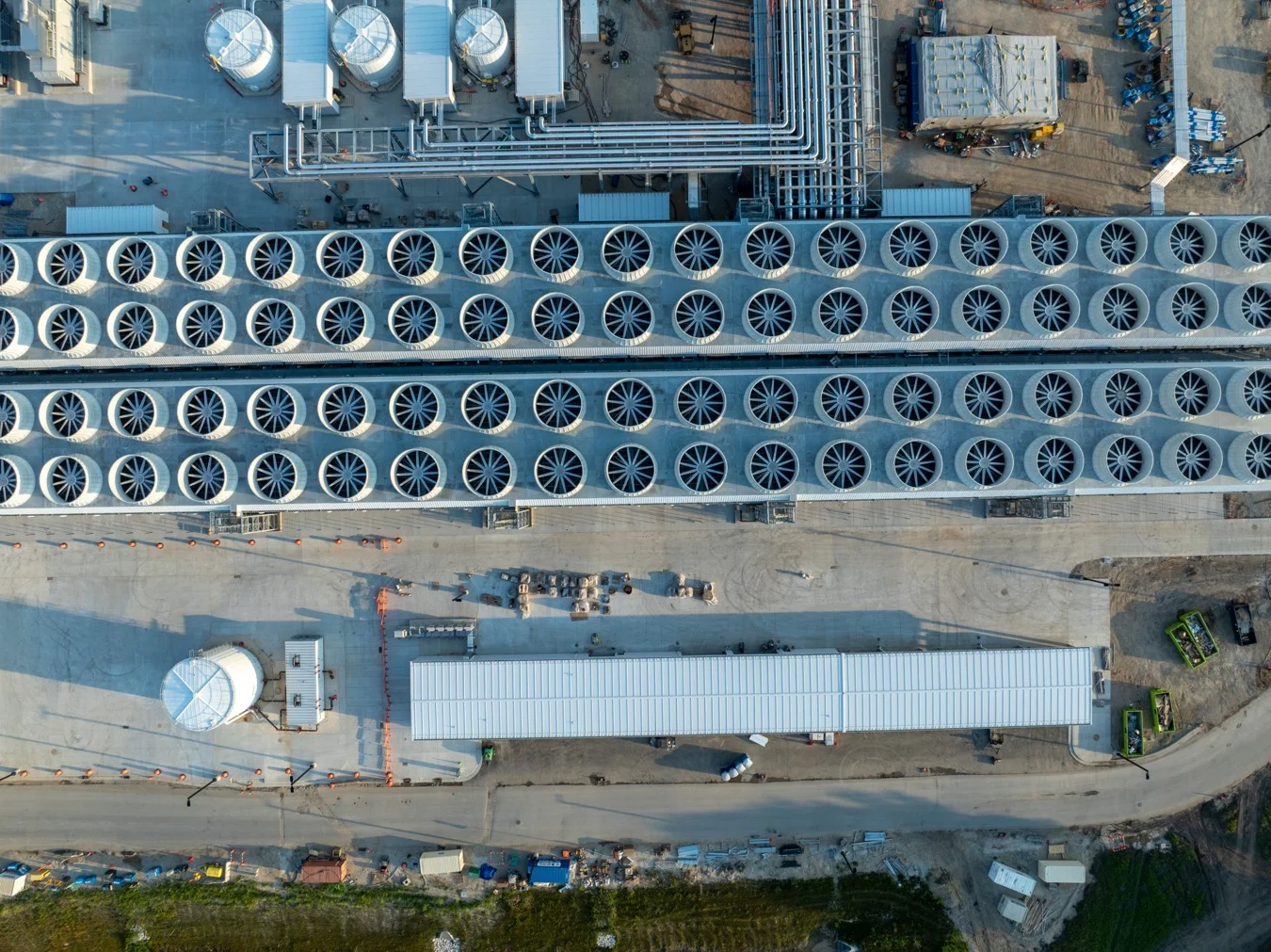 Aerial view of a data centre with rows of circular cooling units