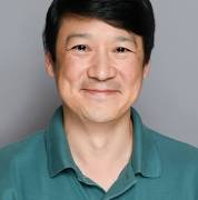 customer giving a testimonial for an ai biotech company [headshot]