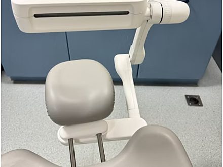 Dental aerosol containment device