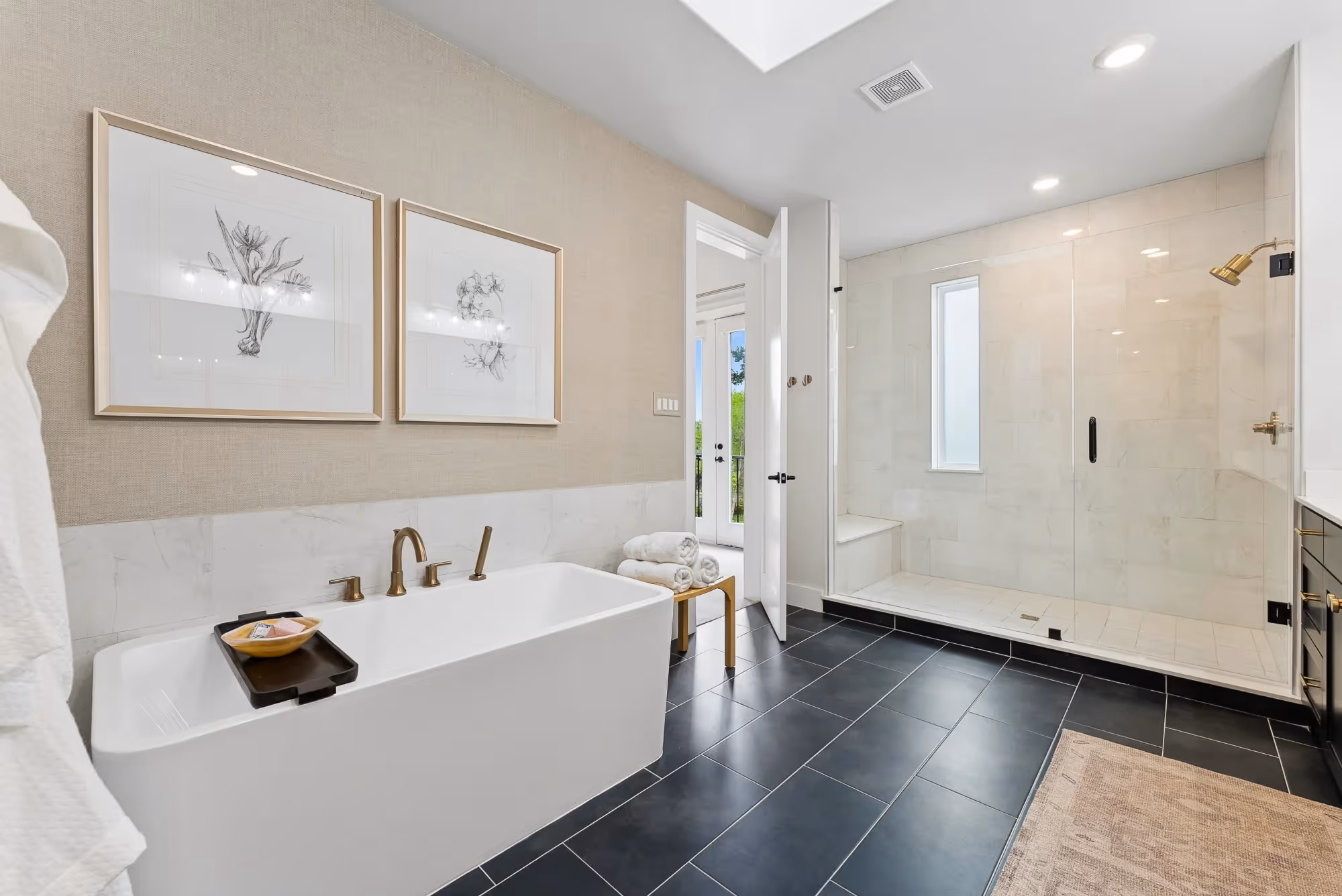 Modern bathroom with freestanding tub and walk-in shower
