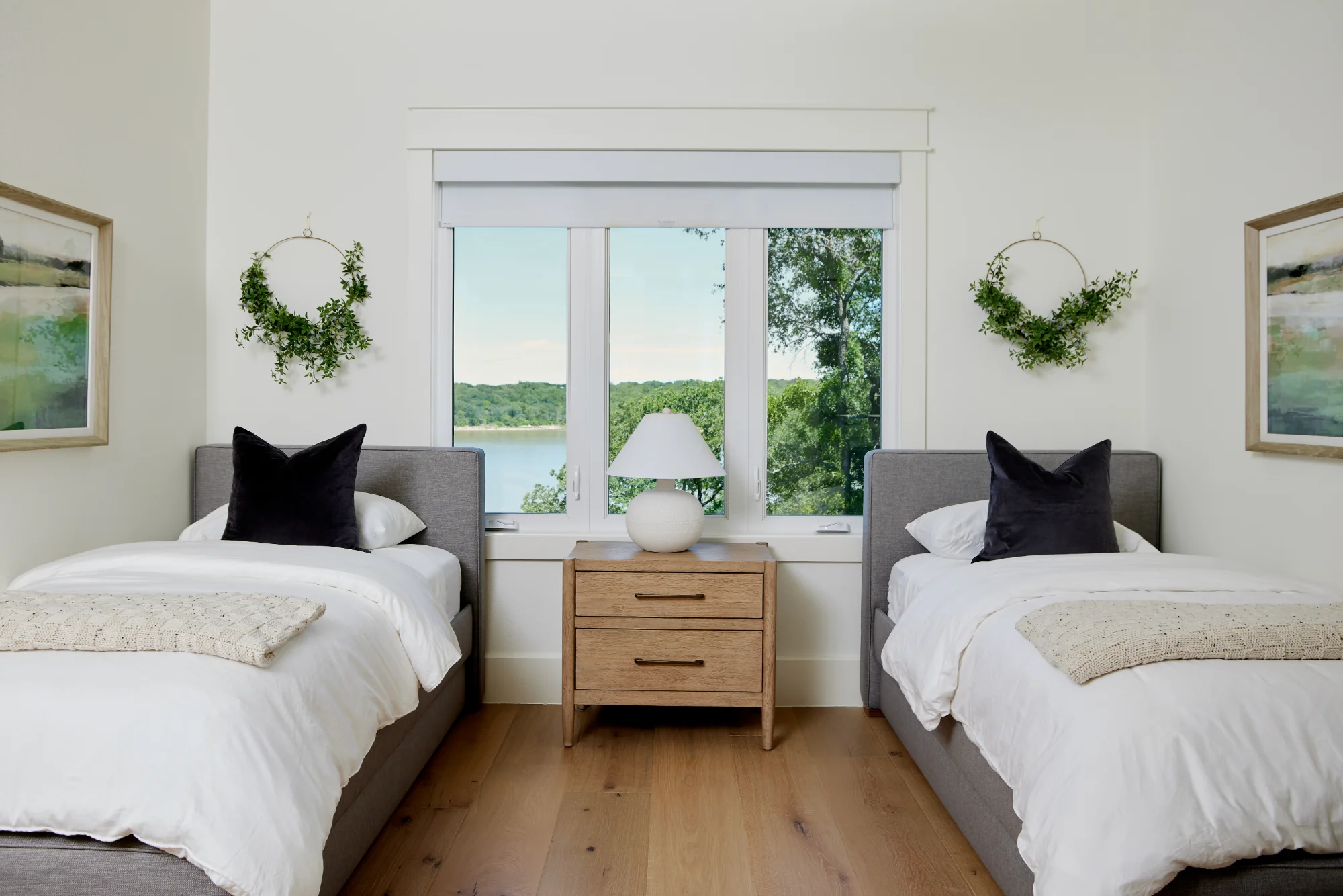 Twin bedroom with two beds and a shared nightstand