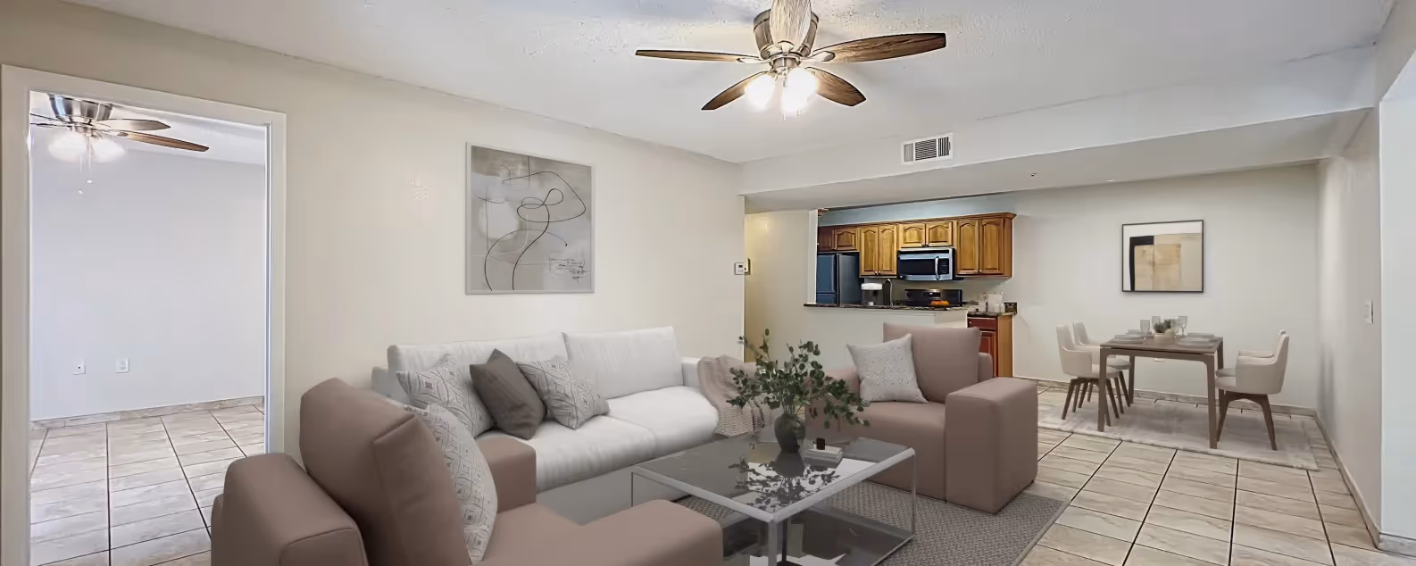 Living area with virtually stages sofa, coffee table, and chairs