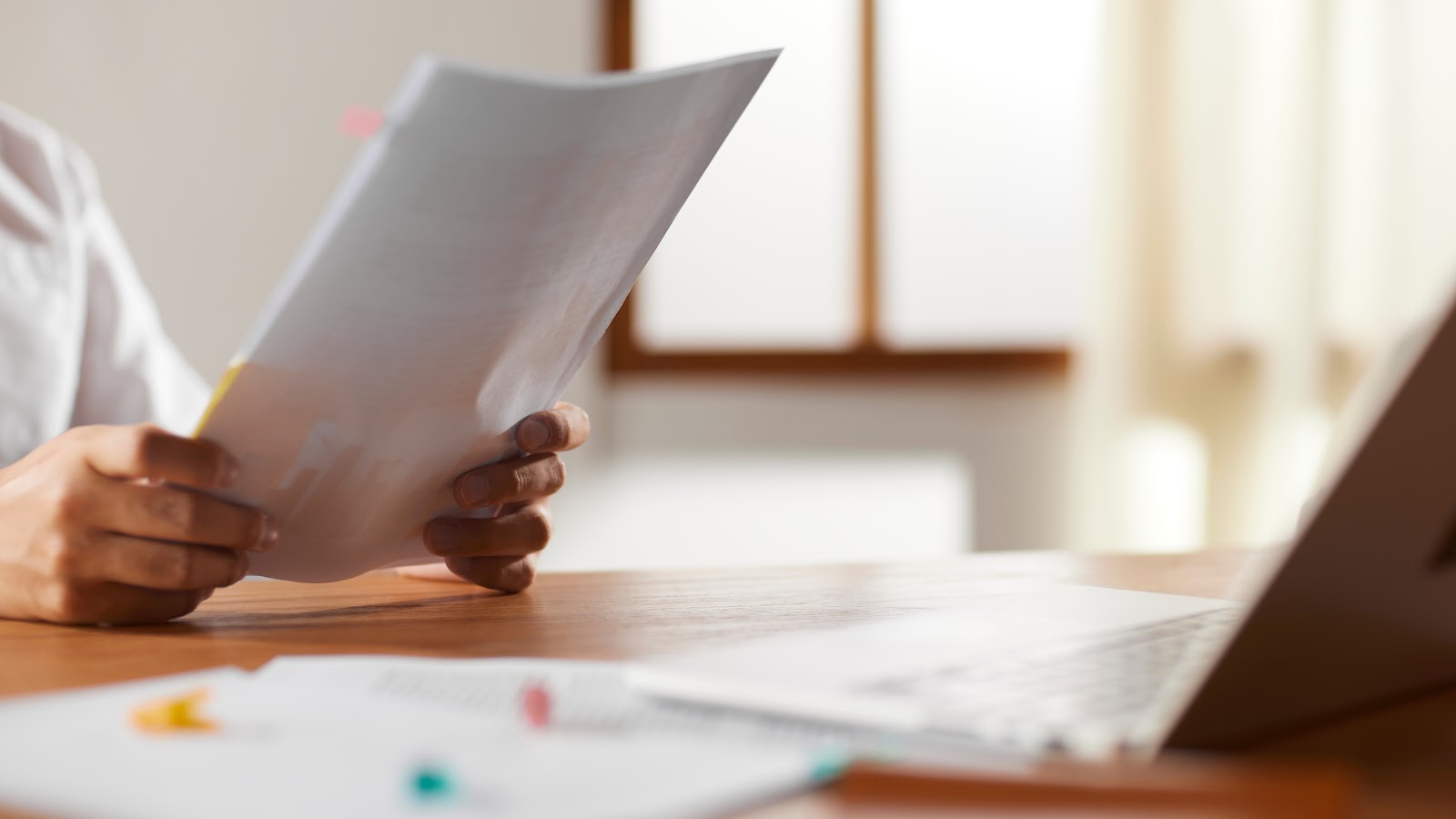 Medical writer reviewing a document