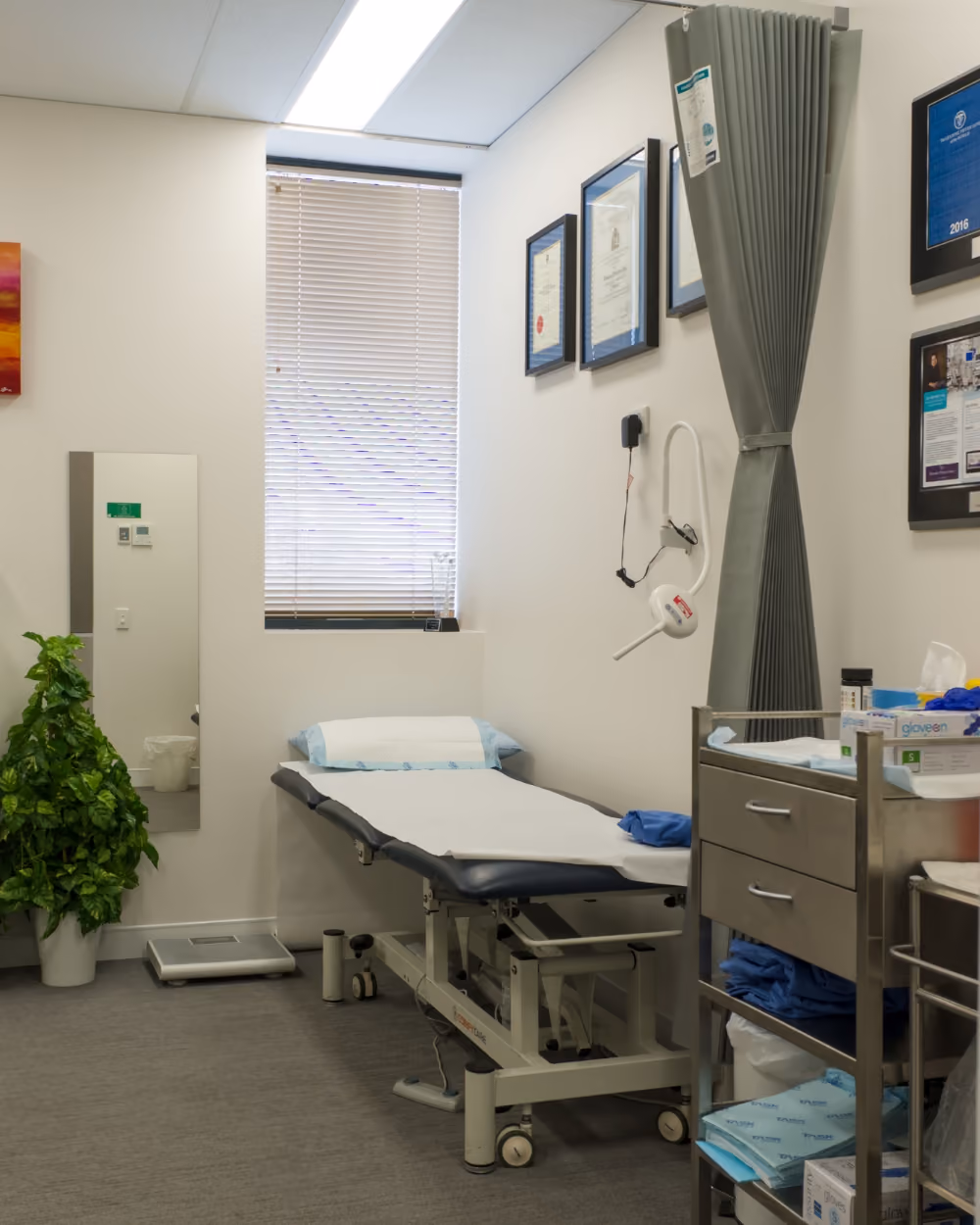 A GP's room with a window.