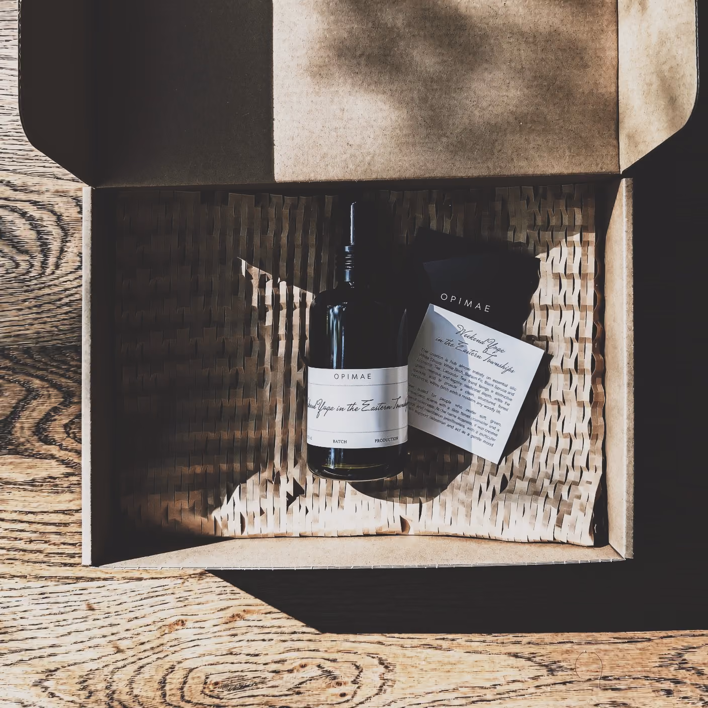 Bottle of A Breath Off an East Coast Trail room perfume in a box