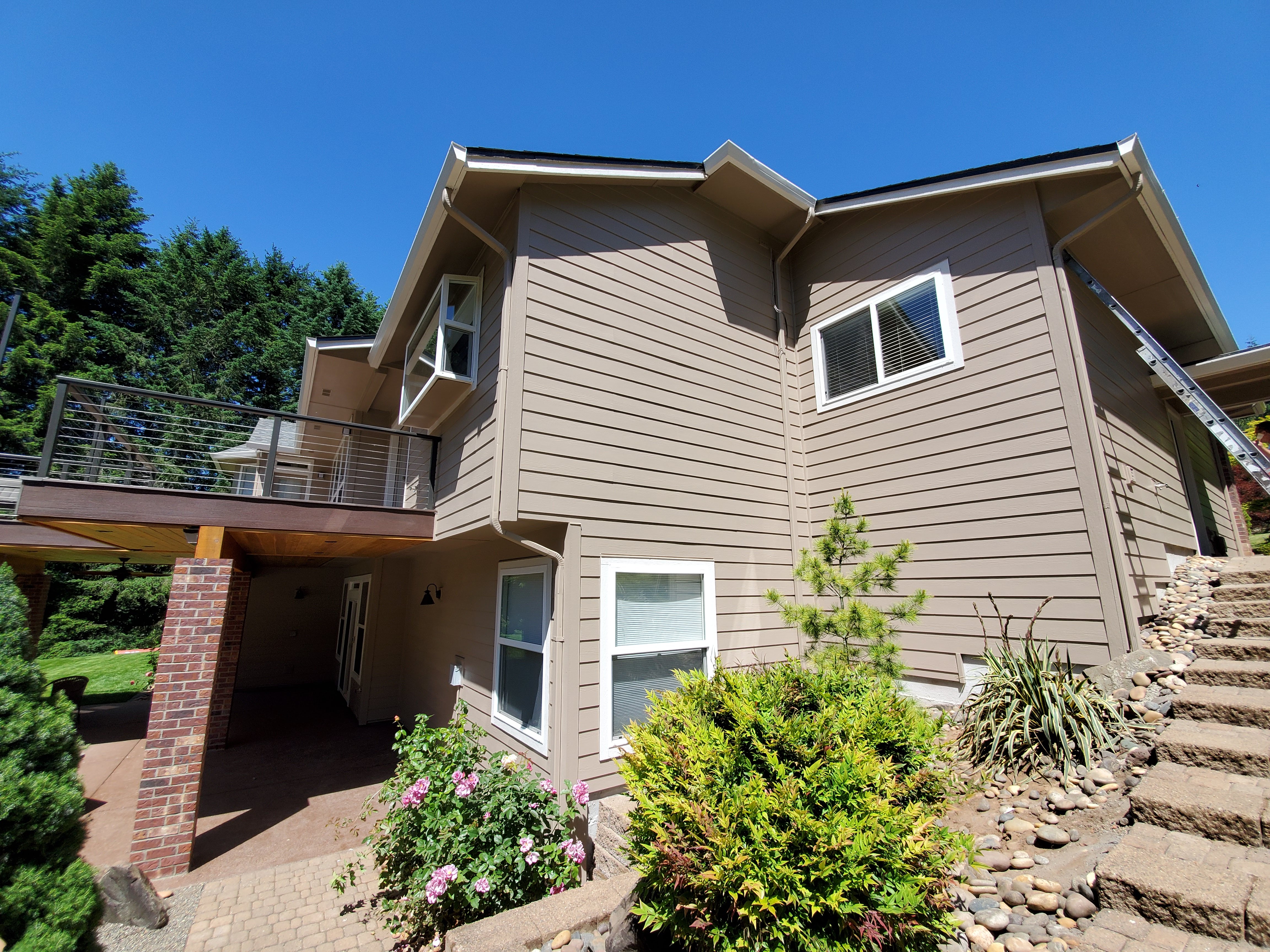 D'S Painting LLC team on a residential exterior painting project — family-owned, 30 years experience