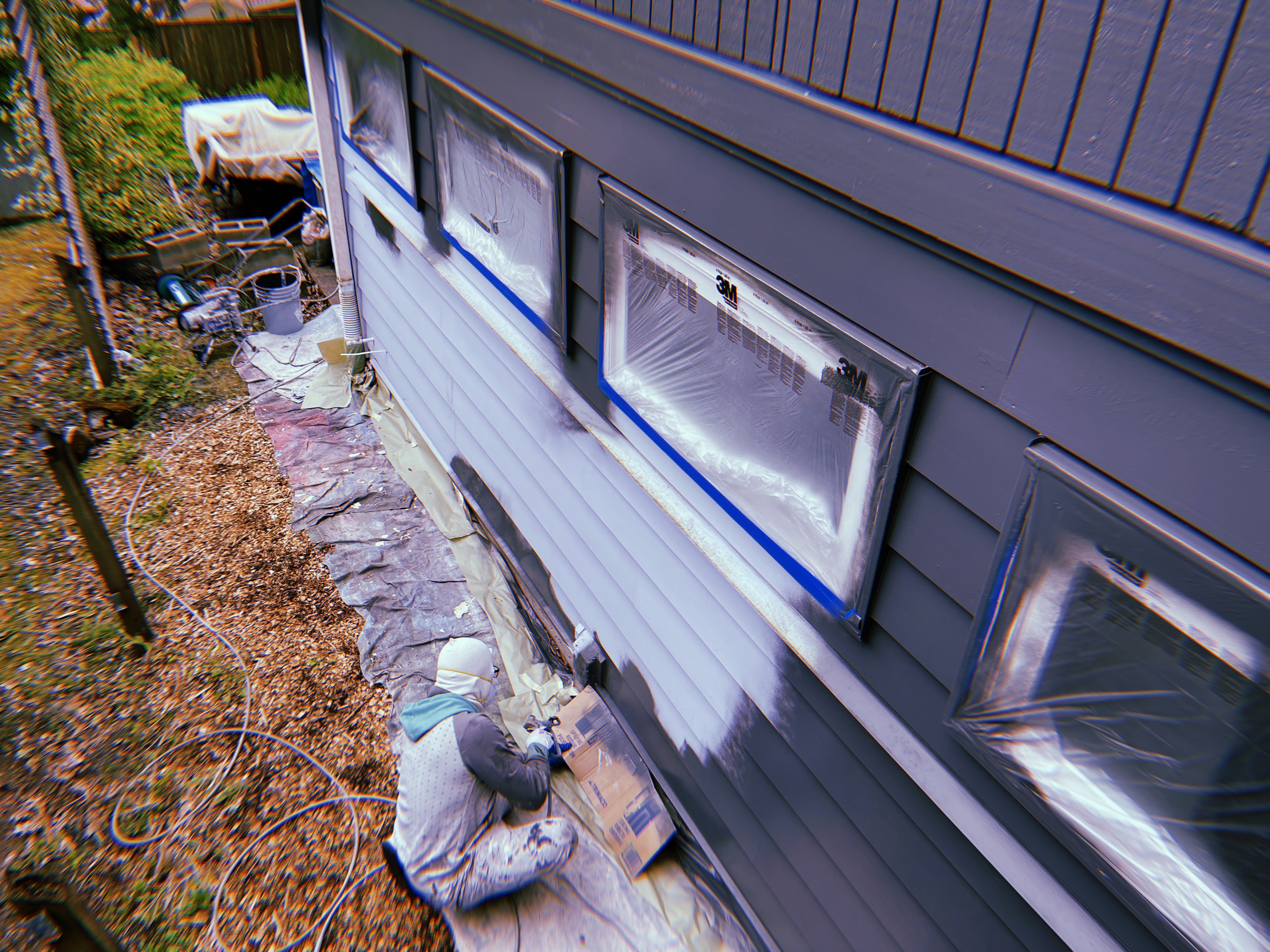 Freshly painted home exterior by D'S Painting LLC — clean, professional Sherwin Williams finish