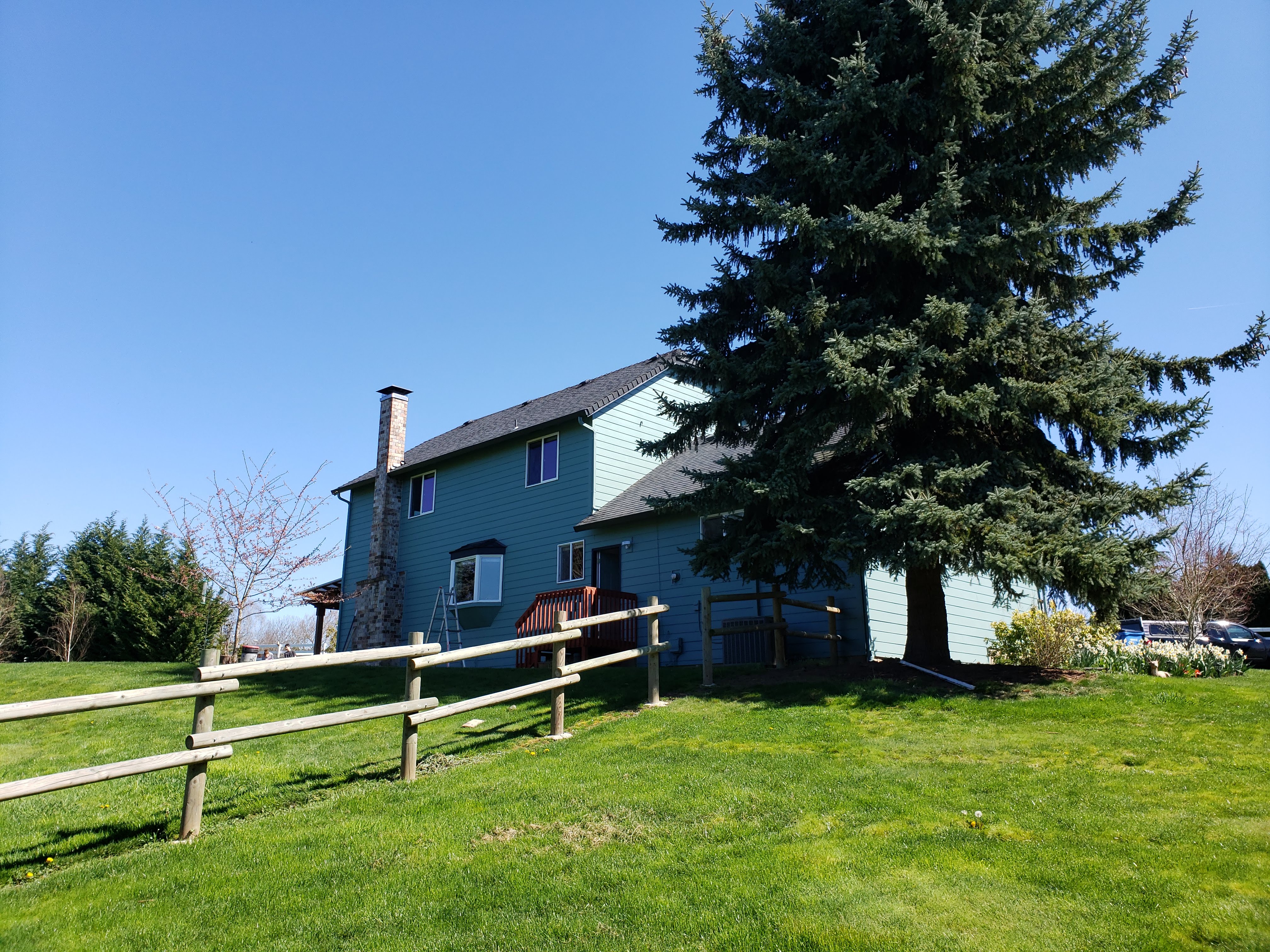 D'S Painting LLC crew on an exterior residential painting project in the Portland, Oregon area