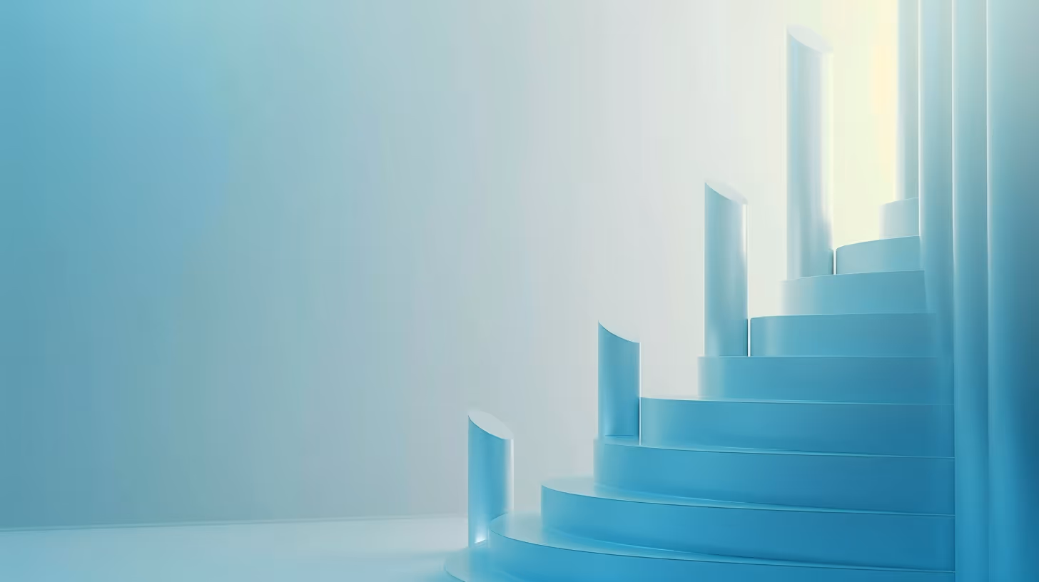 Minimalist blue spiral staircase with light shining from above in a pale room.