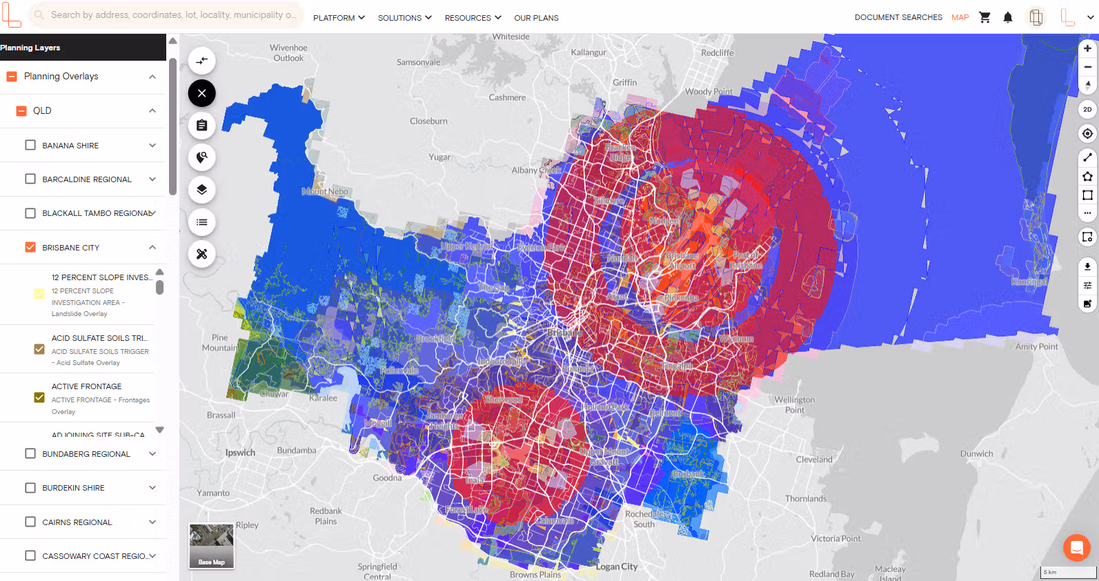 Map showing Brisbane City with colored planning overlays in red, blue, and purple zones.