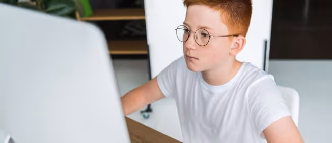 Child using a computer for learning