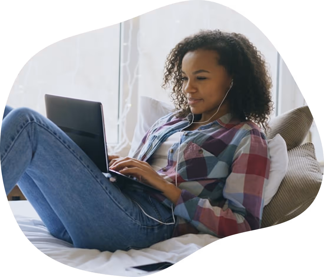 Student with ADHD using a laptop for typing and literacy support