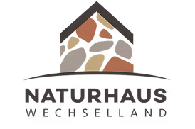 Logo with a stylized house above the text Naturhaus Mecklenburg in block letters.