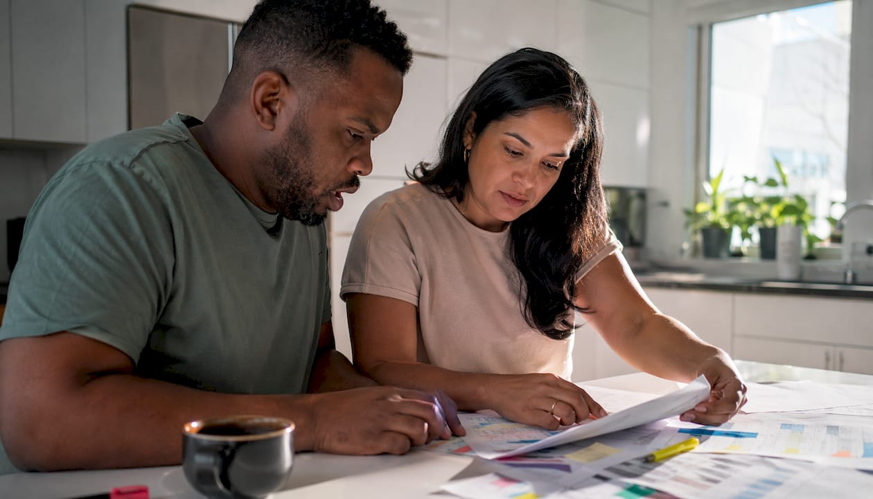 Growth strategists reviewing audit checklist