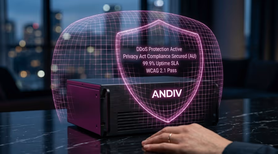 Hand near a black device with a glowing pink shield showing DDoS protection and compliance features.