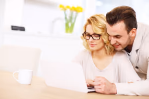 Young couple planning how to make a will