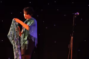Gabriela Georges performs wearing her mother's scarves, as a way to honour her memory and remain connected.