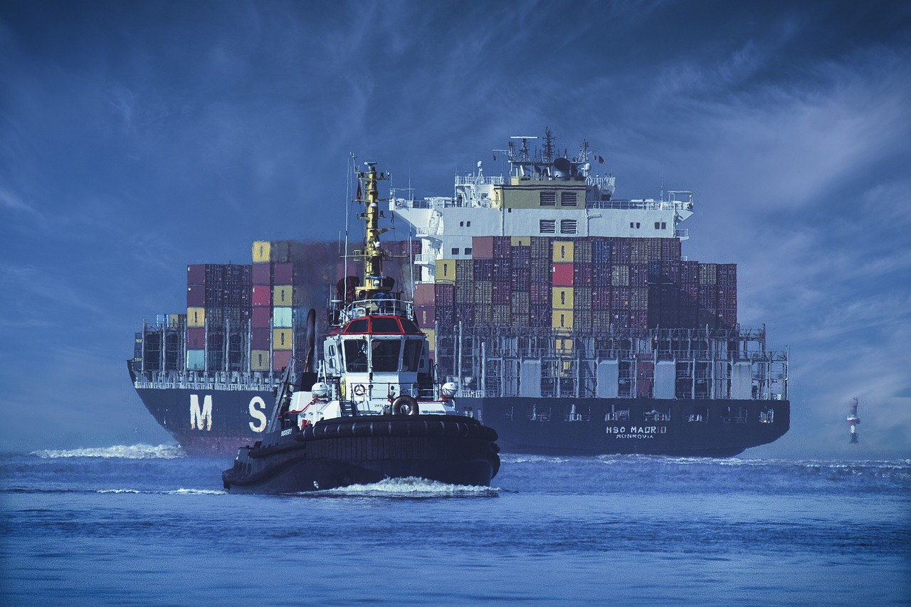 Container-laden ship at sea.
