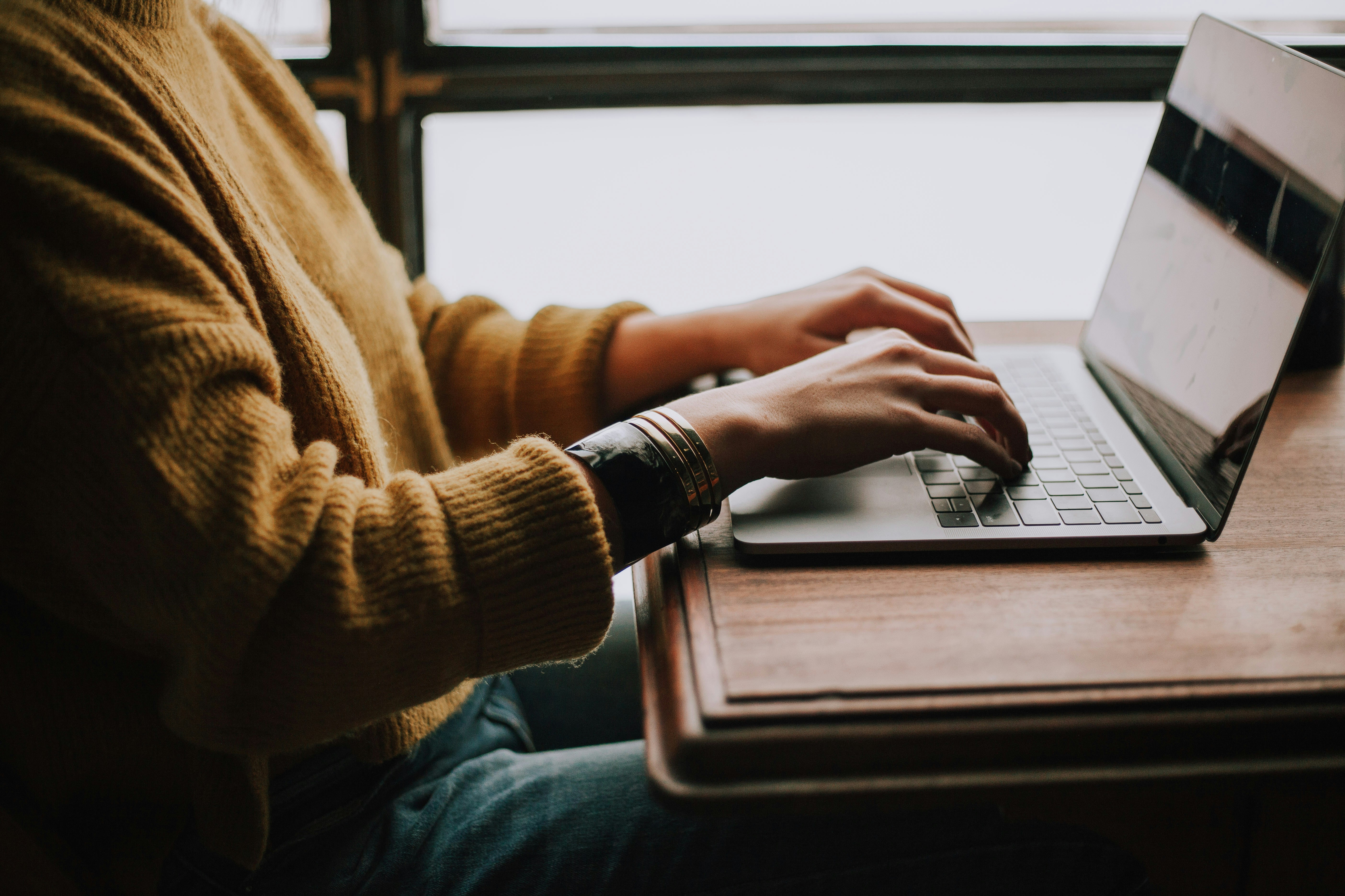 Woman working at a laptop