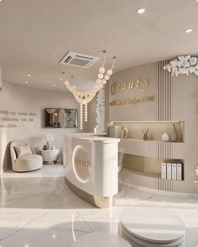Elegant beauty salon reception with white modern desk, gold lettering, and soft beige seating.