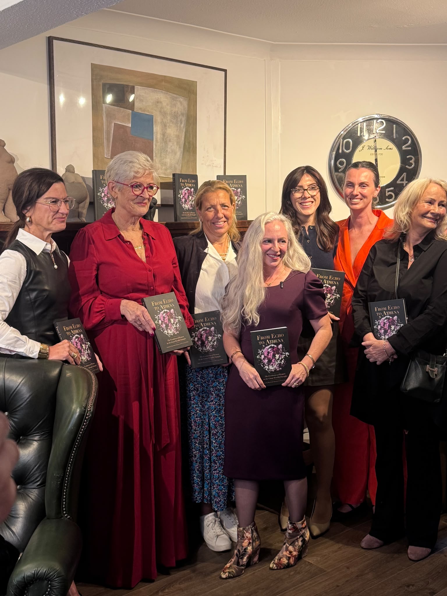 Contributors gather at Dallington in London holding From Echo to Athena on launch week.