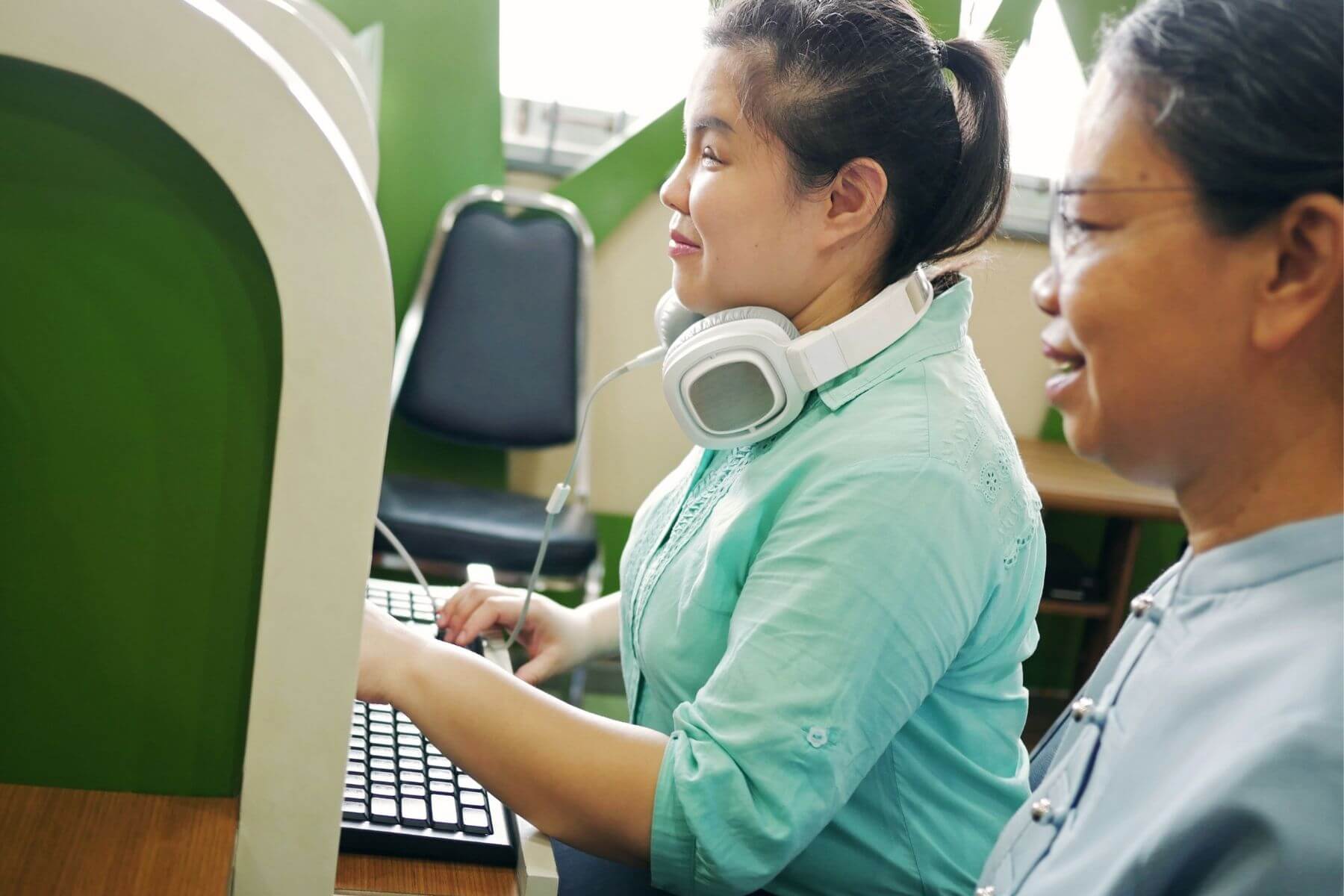 visually impaired woman working on a PC